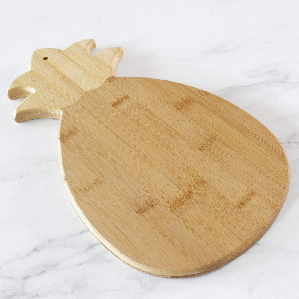 https://thecooksnookmcpherson.com/cdn/shop/products/pineapple-shaped-serving-and-cutting-board-14-38-x-7-12-totally-bamboo-355754.jpg?v=1650646026&width=1000